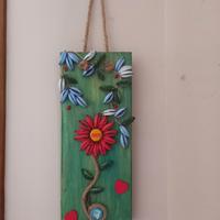 quadro in legno e  tappi di birra