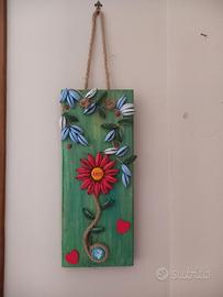 quadro in legno e  tappi di birra