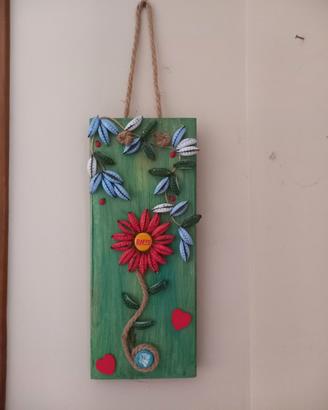 quadro in legno e  tappi di birra