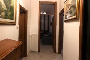 "bilocale con living room ad uso comune