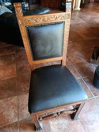 Sedie vintage in legno intagliato con seduta nera