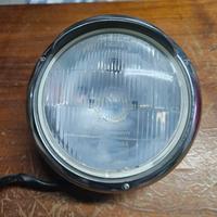 Faro e frecce vintage per moto