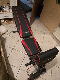 Panca più bilanciere, pesi, manubrio