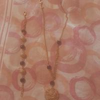 Collana e bracciale oro e lilla