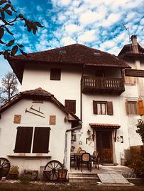 Casa accostata con giardino e frutteto