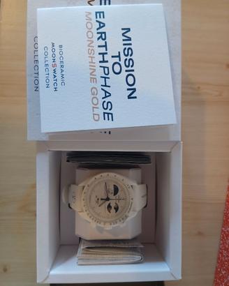 Omegaxswatch mission to earthphase moonshine gold