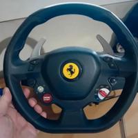 volante e pedaliera thrustmaster.