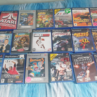 Ps2 con 2 joystick + memory card + 20 giochi