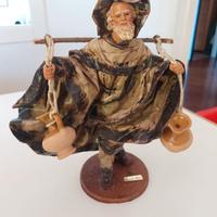 Statua cartapesta uomo con anfore Claudio riso