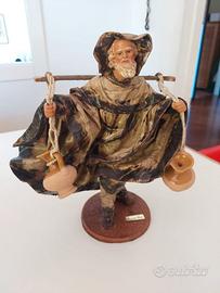 Statua cartapesta uomo con anfore Claudio riso