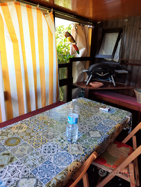 Roulotte con casetta in legno