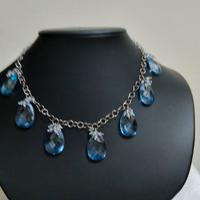 Collana di argento con topazi azzurri nuova!!
