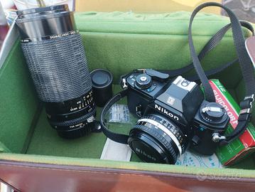 macchina fotografica Nikon EM con obiettivo 