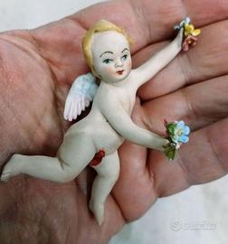 Amorino Putto Puttino in porcellana di Capodimonte