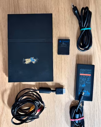 PLAYSTATION 2 SLIM + GIOCHI + DVD – LOTTO RETROGAM