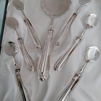 set cucchiaio+ cucchiaini gelato/dolci 
