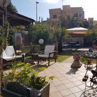 Appartamento con veranda e giardino