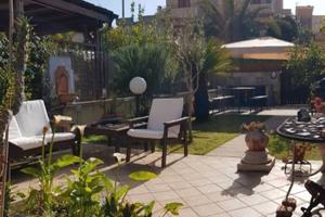 Appartamento con veranda e giardino
