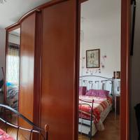 armadio in noce a quattro ante a scorrimento 