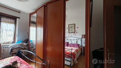 armadio in noce a quattro ante a scorrimento 