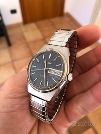 Bulova day date automatico