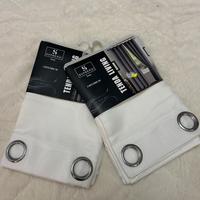 Coppia di tende nuove con cartellino