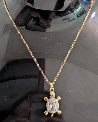 Elegante collana in acciaio placcato oro e Zirconi