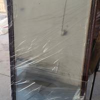 Specchio in piuma di mogano