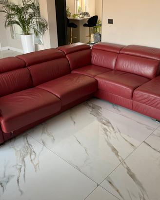 Divano angolare letto in pelle .