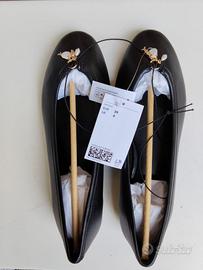 Ballerine classiche con Charms.