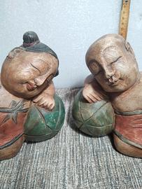 coppia Statuette bambini in legno sumo