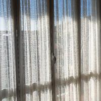 Tende (a vetro) per portafinestra