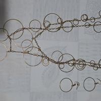 parure collana e orecchini ottone multi cerchi 