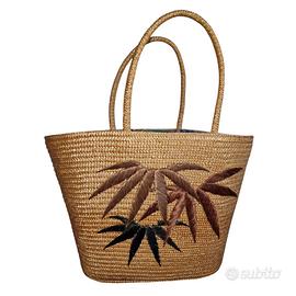 Capiente borsa da spiaggia in paglia intrecciata 
