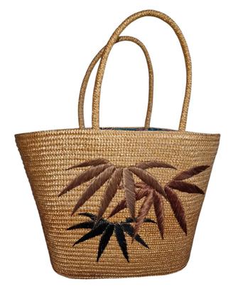 Capiente borsa da spiaggia in paglia intrecciata 