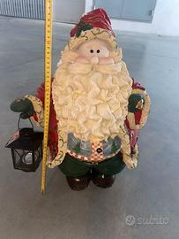 Statua Babbo Natale porta candele