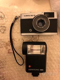 Macchina fotografica e flash