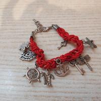 Bracciale homemade corda rossa con vari simboli