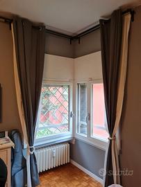 Tende con bastoni doppi