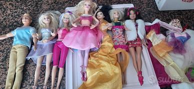 6 barbie +1ken e alcuni vestiti 