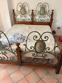 Letto in ferro battuto e legno