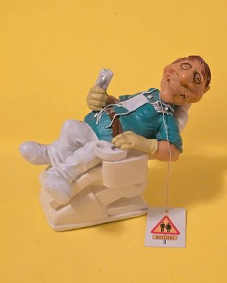 Statuina caricatura dentista