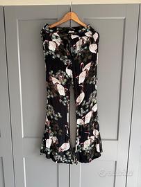 Pantaloni Zara neri con decorazione gru bianche