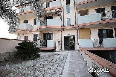 Appartamento a piano rialzato e garage