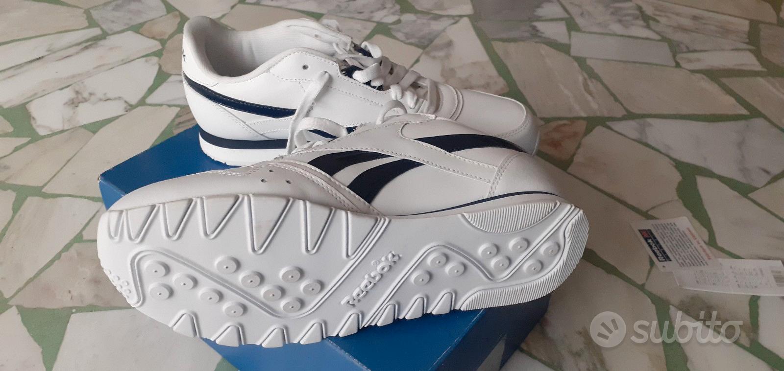 Tuta reebok blu righe bianche hot sale
