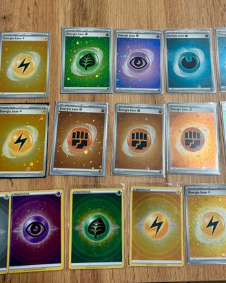 Lotto carte pokemon energie holo swirl vari set