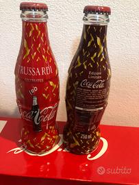Seris 2 bottiglie Coca Cola  wrappate”Trussardi”
