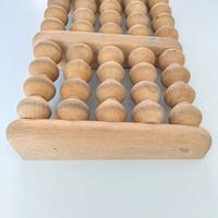 massaggiatore per piedi in legno