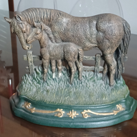 Ferma porta in ferro battuto