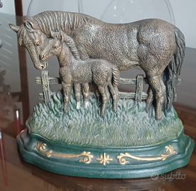 Ferma porta in ferro battuto